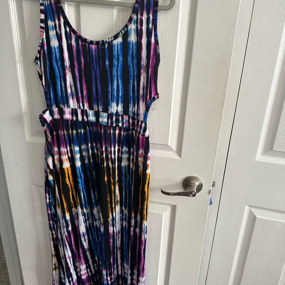 New fun party dress. Open sides and open spot in the back.